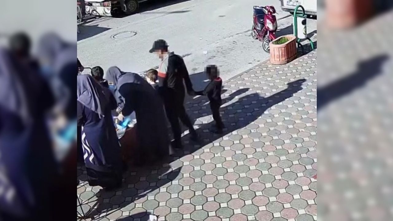 Dikkat çekmemek için çocuğuyla hırsızlığa çıktı, güvenlik kameralarına takıldı