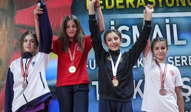 Taşoluk Belediye Spor Kulübü’nden bir şampiyon, bir üçüncülük